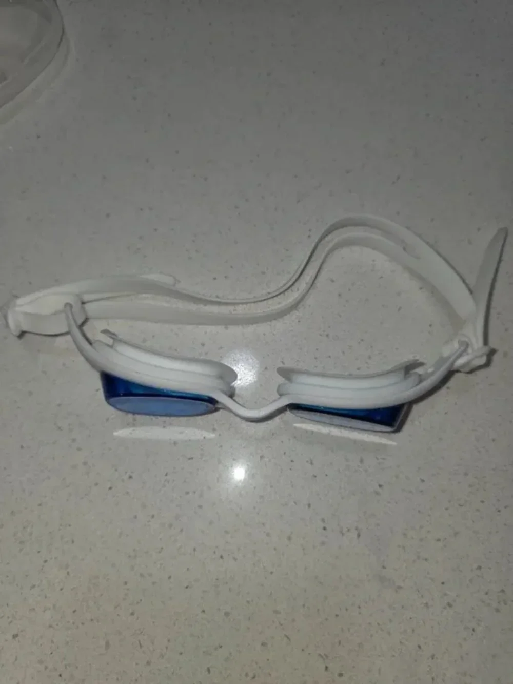 Silicone swim goggles with blue mirrored lenses, white frame, unisex racing styl